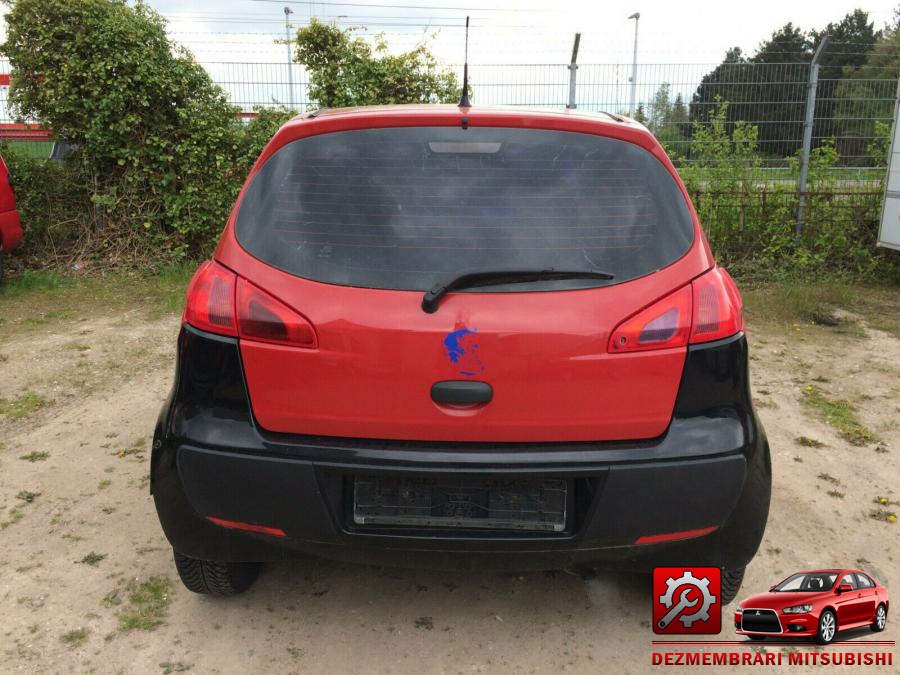 Amortizor capota mitsubishi colt 2004